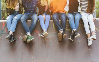 Youth sitting on wall